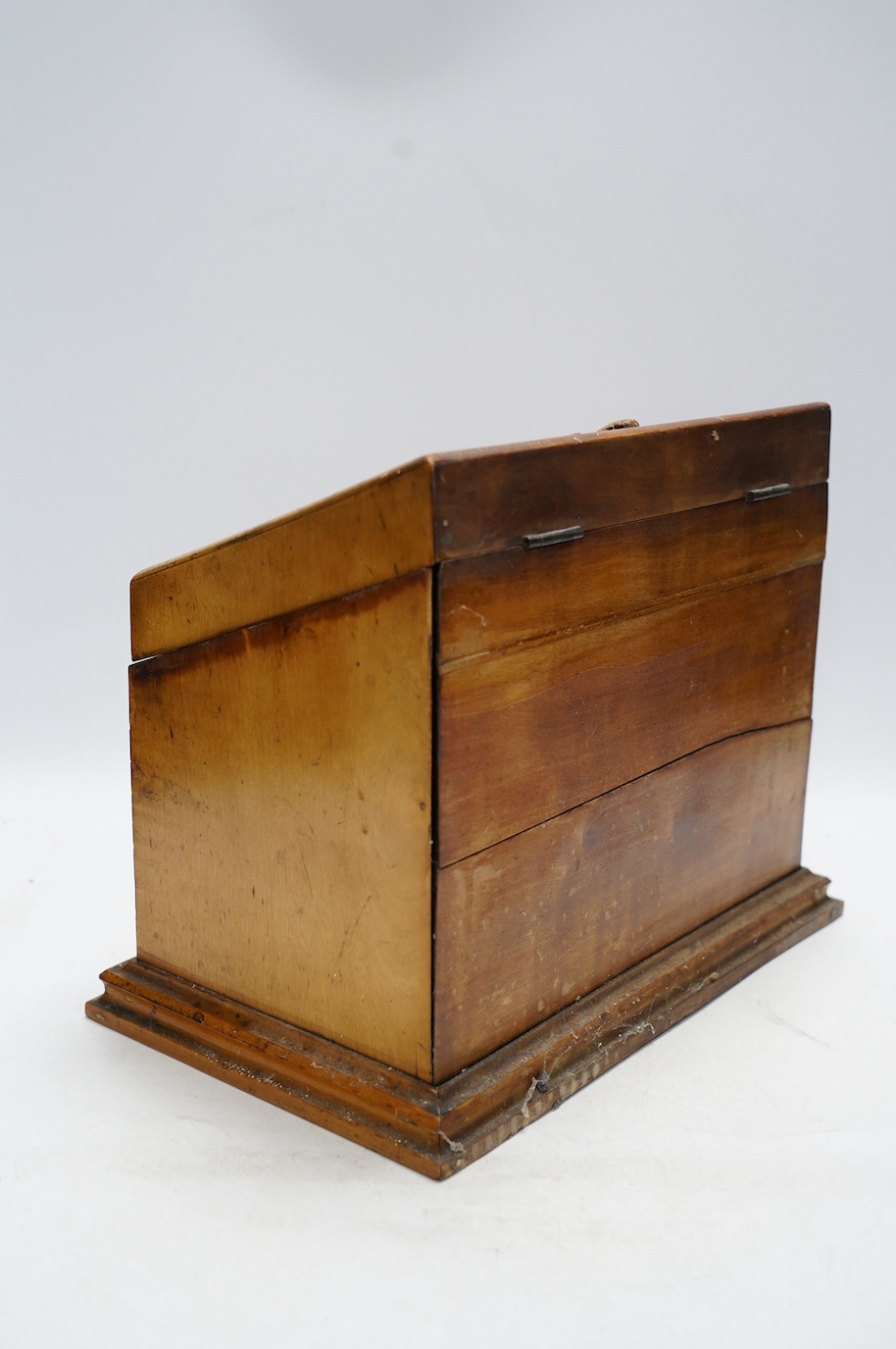 A Victorian carved fruitwood stationery box, 25cm tall. Condition - poor to fair